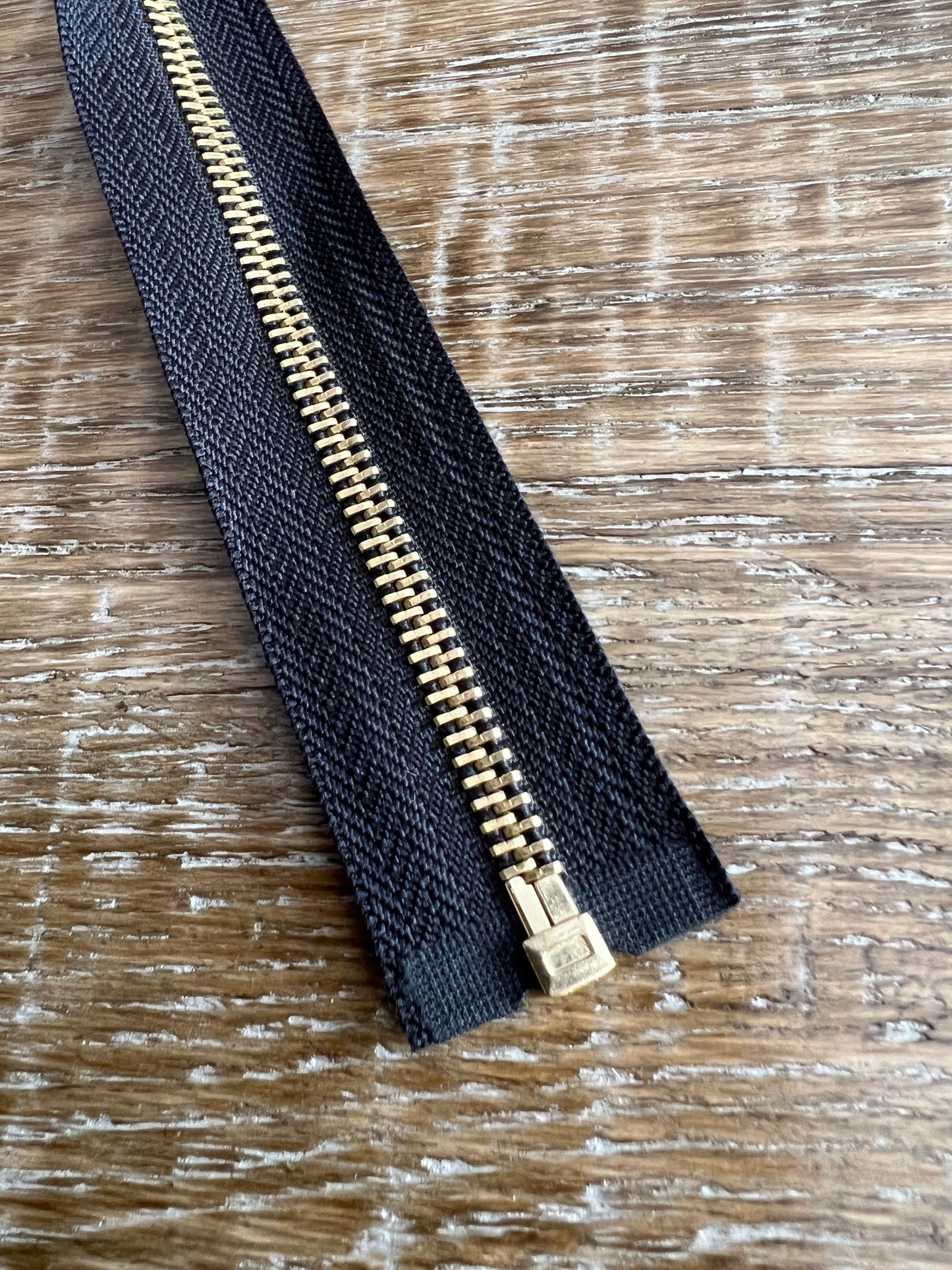 35inch Open End Gold Metal Zipper on Black Tape